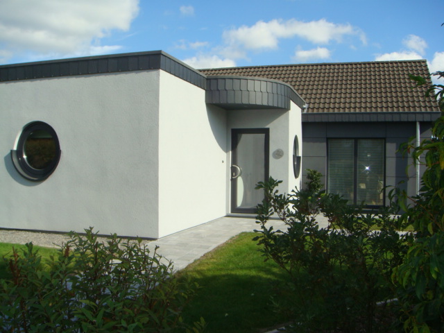 Agrandissement et relooking d'une habitation existante à Henri-Chapelle