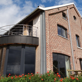 Transformation d'anciennes étables en gîte pour 22 personnes à Henri-Chapelle