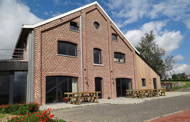 Transformation d'anciennes étables en gîte pour 22 personnes à Henri-Chapelle