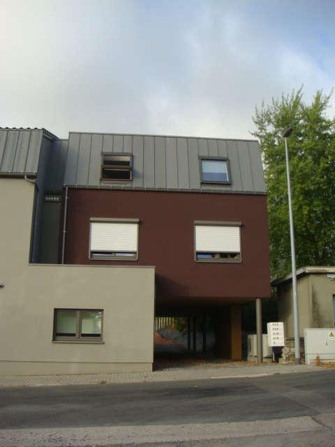 Transformation d'une habitation en immeuble de 5 appartements à Montzen